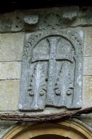 Byzantine panel of the cross above archway in the Cloisters - Iford Manor, Bradford-on-Avon, Wiltshire