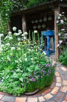 Pottering in North Cumbria, sponsored by University of Cumbria, Cumbrian Homes Ltd, Copeland Borough Council - Silver Flora medal winner for Courtyard Garden at RHS Chelsea Flower Show 2009 
