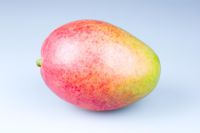Mango fruit against white background