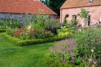 Hampshire Country Garden. Box borders with flowering perennials