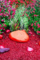 'Seeing Red' garden with dyed red bark chippings - International Gardens Festival, Chaumont-sur-Loire, France