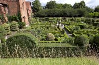 The Tudor Old Palace and Knot Garden at Hatfield House, where Elizabeth 1 spent much of her childhood. Garden contains Buxus - Box and Crataegus - Hawthorn topiary.
 
