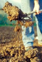 Soil warming. Cultivate the soil by digging it over to leave large, unbroken lumps.  This will create lots of pockets in the soil where warm air can be trapped.