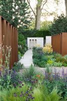 Corten steel screens divide a contemporary gravel garden, with plants including Verbascum 'Clementine', Salvia nemorosa 'Caradonna', Stipa tenuissima, Euphorbia 'Blue Haze', Euphorbia mellifera and Aquilegia - The Daily Telegraph Garden, Best in Show, Gold medal winner, RHS Chelsea Flower Show 2010