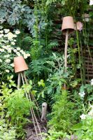 Old clay pots used as cane toppers and wigwam toppers.