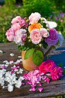 old fashioned roses in vase