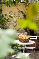 Metal table and chairs at Lo Bianco Terrace in Milan, Italy