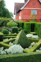 Knot garden with box and santolina. Wyken Hall, Suffolk