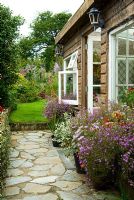 Summerhouse. Poppy Cottage Garden, Roseland Peninsula, Cornwall, UK