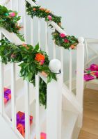 Christmas decorations on staircase 
