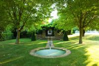 Rill leading to circular pond 
