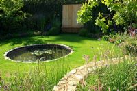 Circular stone borders and pond - 'The Combat Stress Therapeutic Garden', Silver medal winner, RHS Hampton Court Flower Show 2010
 