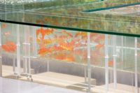 Detail of table with fish tank and goldfish  - 'The B and Q Garden', Gold Medal Winner, RHS Chelsea Flower Show 2011 