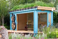 Turquoise painted garden office with 'living roof' made from a refurbished shipping container - 'The Royal Bank of Canada with the RBC New Wild Garden' - Silver Gilt Medal Winner, RHS Chelsea Flower Show 2011
 