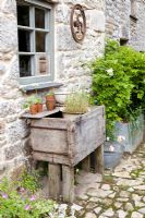 Antique wooden sink outside farm house - Trevoole Farm, Cornwall. A