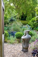 Sculpture in dry garden - Wickets, Essex NGS