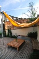 Contemporary roof garden with wooden deck, canvas awning and trough containers -Clerkenwell, London, England, USA 