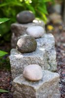Cobble stones and pebbles on gravel path