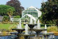 View of the Tropical House and fountains - Cambridge University Botanic Gardens.