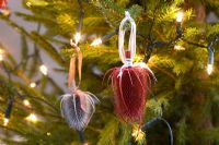 Making homemade Christmas tree decorations with sprayed seedheads - The finished decoration