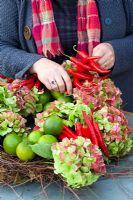 Making a Christmas wreath - Adding chillies and Hydrangeas