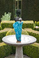 Sculpture in formal garden