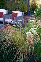 The Landform Garden. Designed by Catherine MacDonald. Sponsored by Landform Consultants Ltd. Inspired by aspects of the High Line in New York incorporating linear hard landscaping contrasting with soft, naturalistic planting.