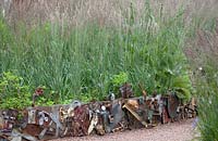 Fence of recycled carparts. Conceptual garden showing unique physiographic feature of Suncheon Bay.