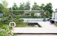 Feel Good Garden. Vertical garden wall and swimming pool.