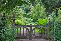 Green oak double gate leading to the Southern Hemisphere Garden, Highgrove August 2012.