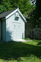 Metal garden shed with dovecote