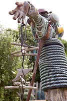 Scarecrow made from recycled coastal objects - Coastal allotment, Mousehole, Cornwall