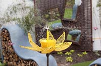 Watering sprinkler made from wire in the shape of a flower 