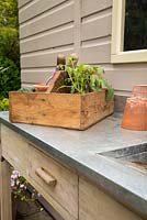 Potting bench and assorted gardening tools