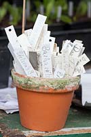 Pot full of plant labels