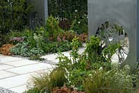Contemporary garden with granite paving and stainless steel art panels - 'Solar Chic' Show Garden, Silver Award, Malvern Spring Show 2013