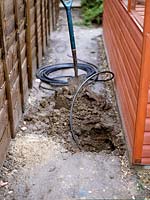 Electrical wiring in greenhouse - armoured cable going under foundations electricity