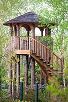 Tree House made from Larch at Foggy Bottom, The Bressingham Gardens, Norfolk, UK.