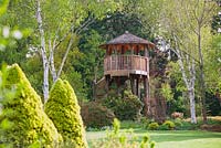 Tree House made from Larch at Foggy Bottom, The Bressingham Gardens, Norfolk, UK.