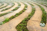 Garden feature Labyrinth at The Edge. Walking the labyrinth, a distance of 1.4 kilometers is said to have meditative effects