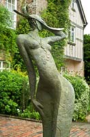 Sculpture 'Artemis' by Alexandra Beale - many of Britain's leading sculptors exhibit their work at Pashley Manor House and Gardens, and they are positioned around the gardens by the authors, in conjunction with the garden staff.  
