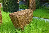 Stockton Drilling as Nature Intended Garden, Silver gilt medal winner, Chelsea Flower Show 2013. Woven willow structure surrounded by barley planting 
