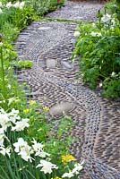 Curved pebble path in the Get Well Soon Garden