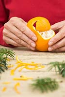 Removing peel from an orange