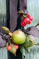 Simple Autumn front door decoration with apples