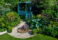 Arbour seat and gravel path, Bens Acre, West Sussex, owned and designed by Pauline Clarke