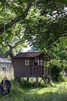 Wooden tree house or wendy house at Chateau Rigaud, Bordeaux, France