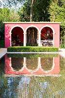 The pavilion at the end of the pool, with low clippped formal hedge of box - The Brand Alley Renaissance Garden2014 RHS  Chelsea Flower Show garden awarded Bronze Medal