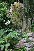 The Forgotten Folly - Ruin with climbing flowering plant 