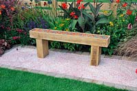 Solid wooden bench filled with coloured glass chippings. Description: The Narrows Garden. Designer: Phillippa Probert, Sponsor: Beers Building Supplies